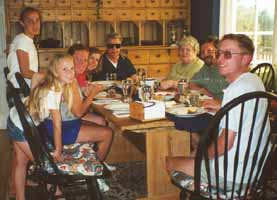 The whole gang around the supper table.