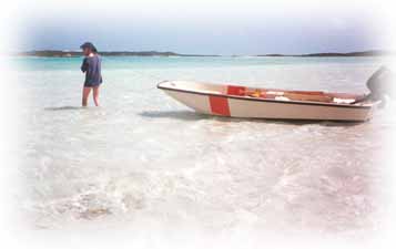 Pulling the boat over the shallows.